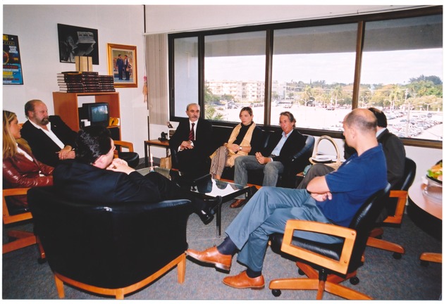 Miami Beach Mayor David Dermer with Guests Around Coffee Table
