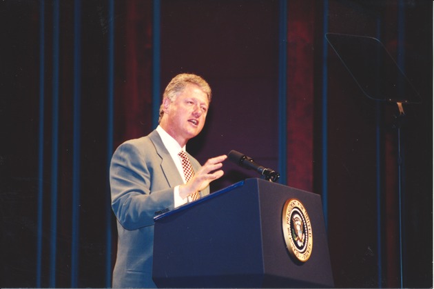 President Bill Clinton Speaking During Ceremony - Image 1