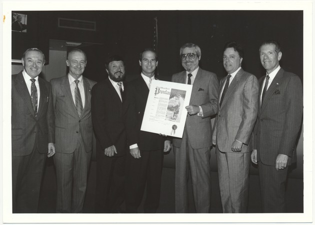 City officials during Miami Beach Commission meetings and public events in the 1980s - Photograph, recto: [City officials presenting Proclamation]