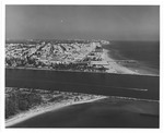 Aerial views of oceanfront buildings and Miami Beach, late 1960s