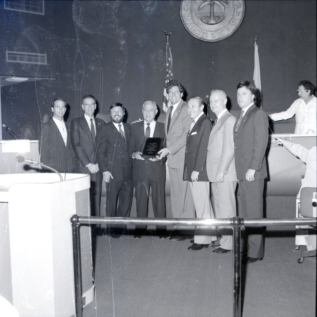 Miami Beach Japanese Garden and Commission events - Negative: [City officials awarding George Wolpert in the Commission Chambers]