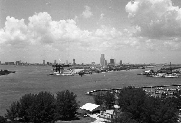 South Point area during the 1980s - Negative: [Aerial view of the Port of Miami and Miami from South Point]