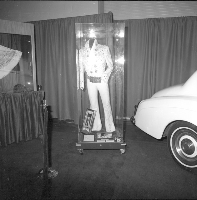 Flea market inauguration and stalls, June 1987 - Negative: [View of Elvis Presley outfit at flea market]