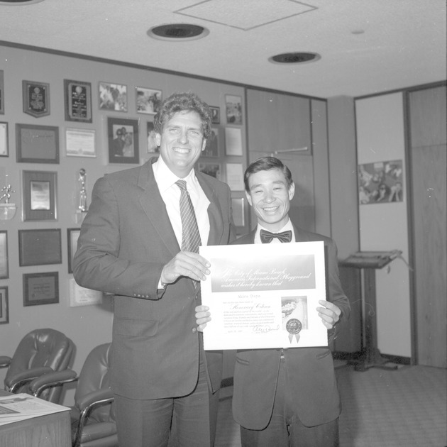 Miami Beach Mayor Alex Daoud presenting awards to Tokyo Joe's, Normandy Supermarket 1987 - Negative: [Alex Daoud presenting Honorary Citizen award to Akira Itaya]