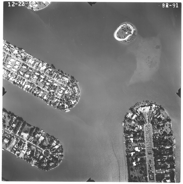 Aerial view of Star Island, Palm Island, Hibiscus Island, and the Flagler Memorial - Recto Photograph