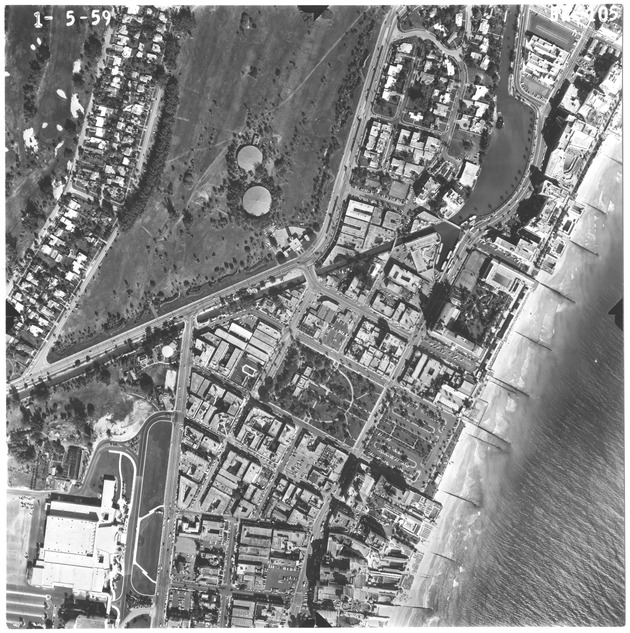 Aerial view of oceanfront buildings between 18th Street and 26th Street. View of Pancoast Lake on the right - Recto Photograph