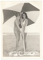 Bobbi Shaw and Corinna Tsopei  - beach modeling scene