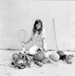 Posed images of adolescents with sporting gear