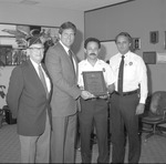 Outstanding Awards for 1985 to Firefighter Manuel Aguila, Officer Richard Mendoza, and unnamed woman, from American Legion Miami Beach Post #85