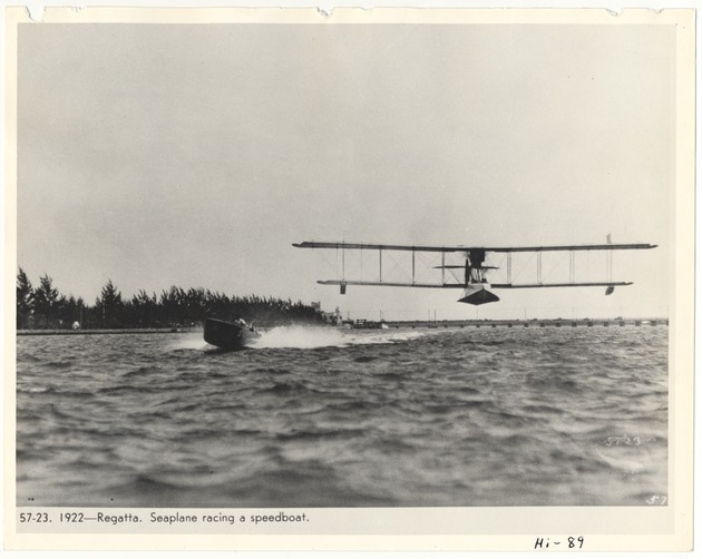 Seaplane racing a speedboat - Recto Photograph