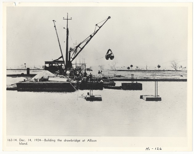 Crane building the drawbridge at Allison Island - Recto Photograph