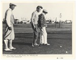 Jim Brophy, Dan Mahoney and Carl G. Fisher playing golf