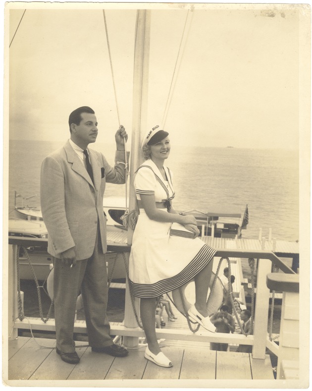 Man and woman on a Miami Beach dock - Recto