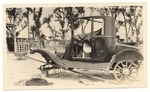 [1927-04-04] Ford Coupe located in the rear of Better Service Garage