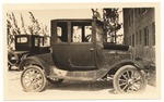 [1927-04-01] Ford Coupe located on West Ave and Ninth Street