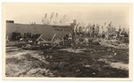 [1926-12-15] Divine's Building Material scattered on lot on 7th and Washington