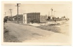 [1926-12-10] Construction shack located in the rear of gas station at Eleventh and Washington