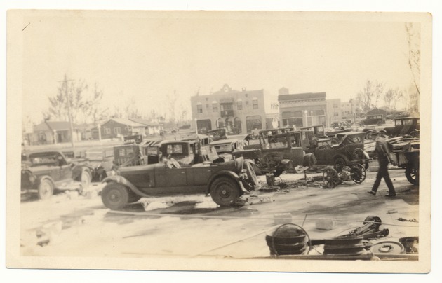 Automobiles on yard at True-White Garage, picture taken looking south - Recto Photograph