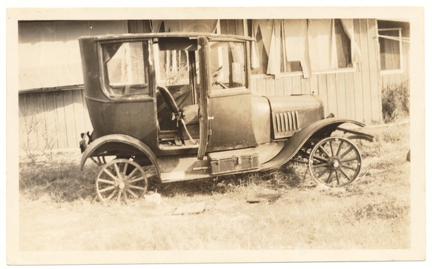 Ford Sedan located at Tenth and Washington - Recto Photograph