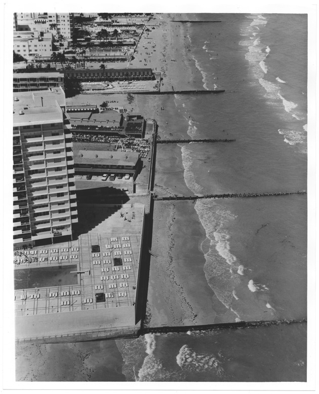 View of hotels on ocean front during high tide - Recto Photograph
