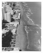 [1972-03] Aerial views of hotels and their pools and gardens right on the ocean front