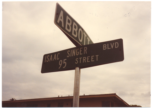 Isaac Singer Blvd and Abbott Avenue Street Signs - 