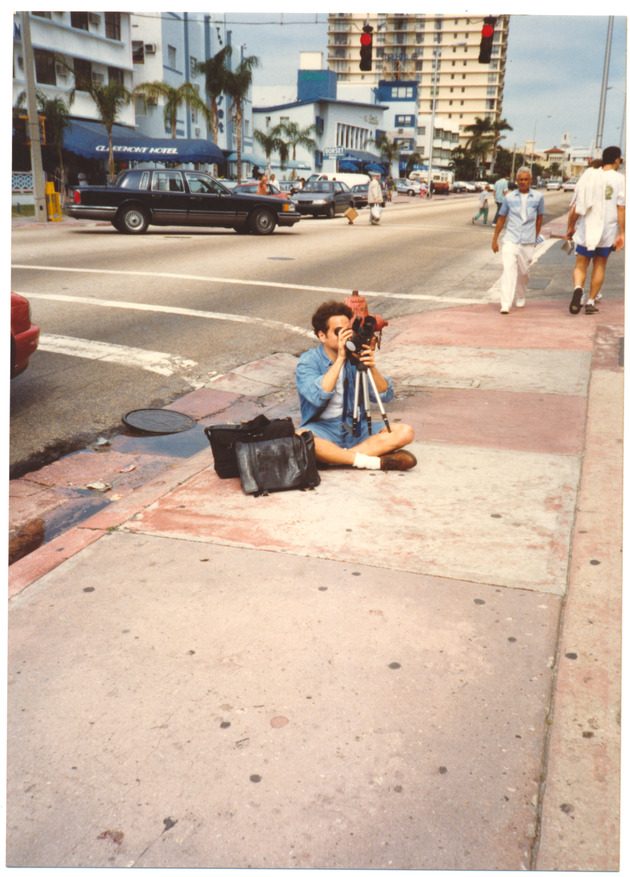 Photographer on sidewalk - 