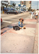Photographer on sidewalk