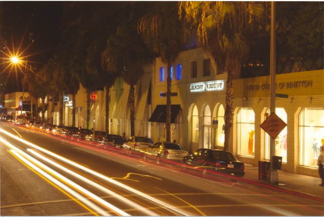 Collins Avenue storefronts at night - 