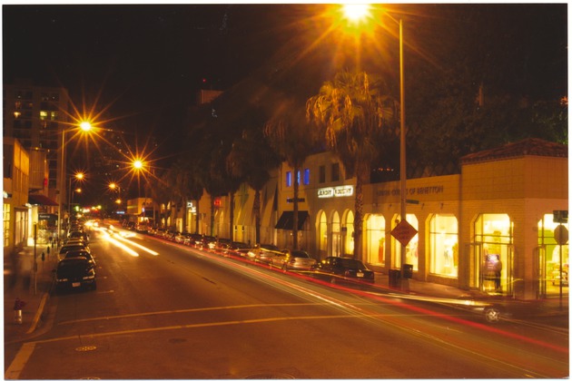 Stores on Collins Avenue at night - 
