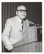 [1970/1989] Unidentified man at podium
