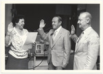 [1980/1990] City Clerk Elaine Baker swears in Sidney Weisburd and  Abe Resnick as new elected officials