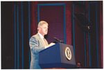 [1994] President Clinton on stage at a podium