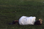 [2009] Man laying on grass