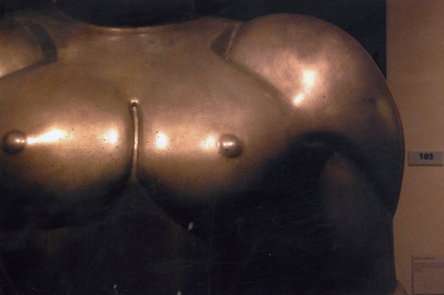 Metalic sculpture of a torso