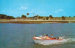 A postcard of boaters on Matanzas Bay in front of the Castillo de San Marcos, looking West, ca. 1965