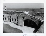 The interior courtyard of the Castillo de San Marcos with the staircase to the terreplein and a view of Matanzas Bay and the St. Augustine Inlet, looking East, 1960
