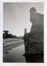 [1960] The northwest and northeast bastions of the Castillo de San Marcos seen from the moat level of the Castillo, looking East, ca. 1960