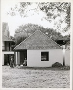 [Gonzales House from rear yard, open with interpreters in period dress, looking West]