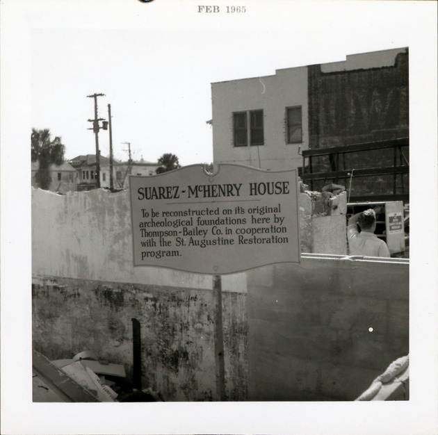 [Construction of McHenry House, sign stating that the Suarez-McHenry House is being reconstructed on its original archaeological foundations, 1965] - 