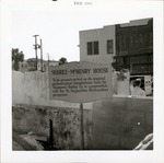 [Construction of McHenry House, sign stating that the Suarez-McHenry House is being reconstructed on its original archaeological foundations, 1965]