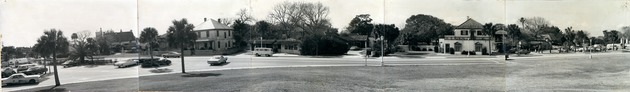 A panoramic view of the properties adjacent the Castillo de San Marcos along San Marco Avenue (sometimes referred to as Fort Circle), with the Castillo parking lot on the far left and the City Gates on the far right, looking Southwest, ca. 1965