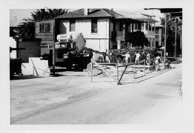 Construction of the Herrera House, pouring the sidewalk, looking Northwest