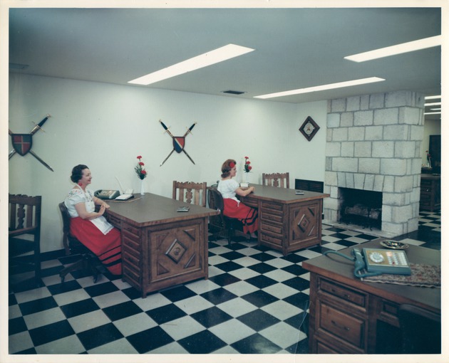 Herrera House interior, Southern Bell Telephone staff in Spanish period dress seated at desks
