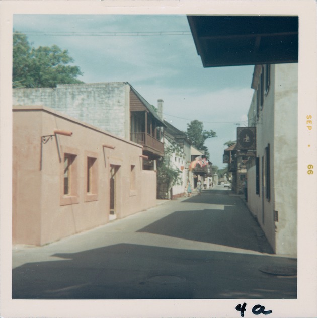 Corner of St. George Street and Cuna Street with Sanchez de Ortigosa on left and Oliveros House on right, looking North, 1966