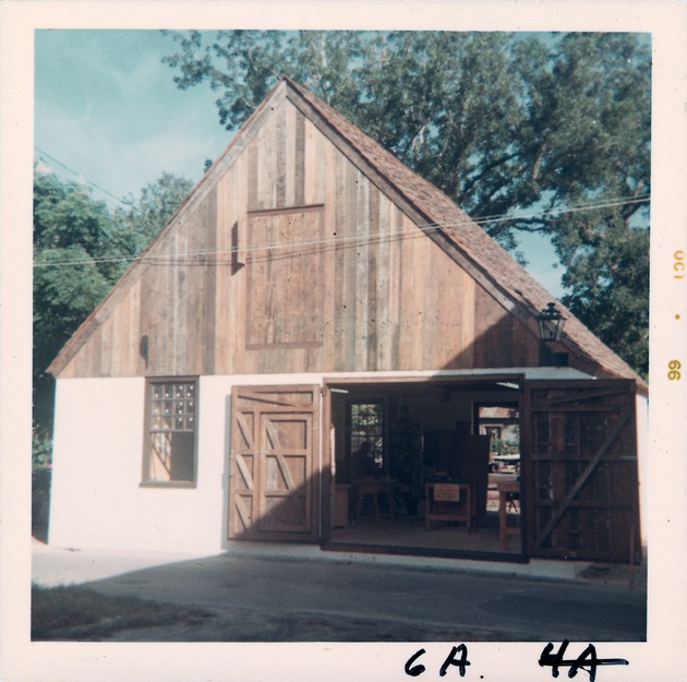 Coquina Warehouse from Cuna Street, doors open, looking North, 1966