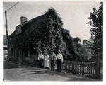 Old timers in front of the Oldest School House, from the corner of St. George Street and Tolomato Lane, looking Southwest
