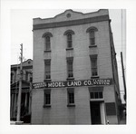 Model Land Company office, on east wing of City Hall complex, from the corner of St. George Street and Hypolita Street, looking North