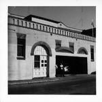 Fire Station, west wing of City Hall complex with firemen and engine in garage entrance, from Hypolita Street, looking Northeast, 1968<br />( 2 volumes )