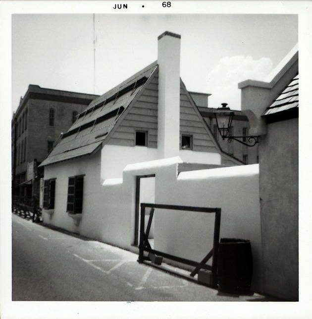 Construction of the Ortega House, shingling roof, from St. George Street, looking Southwest, 1968